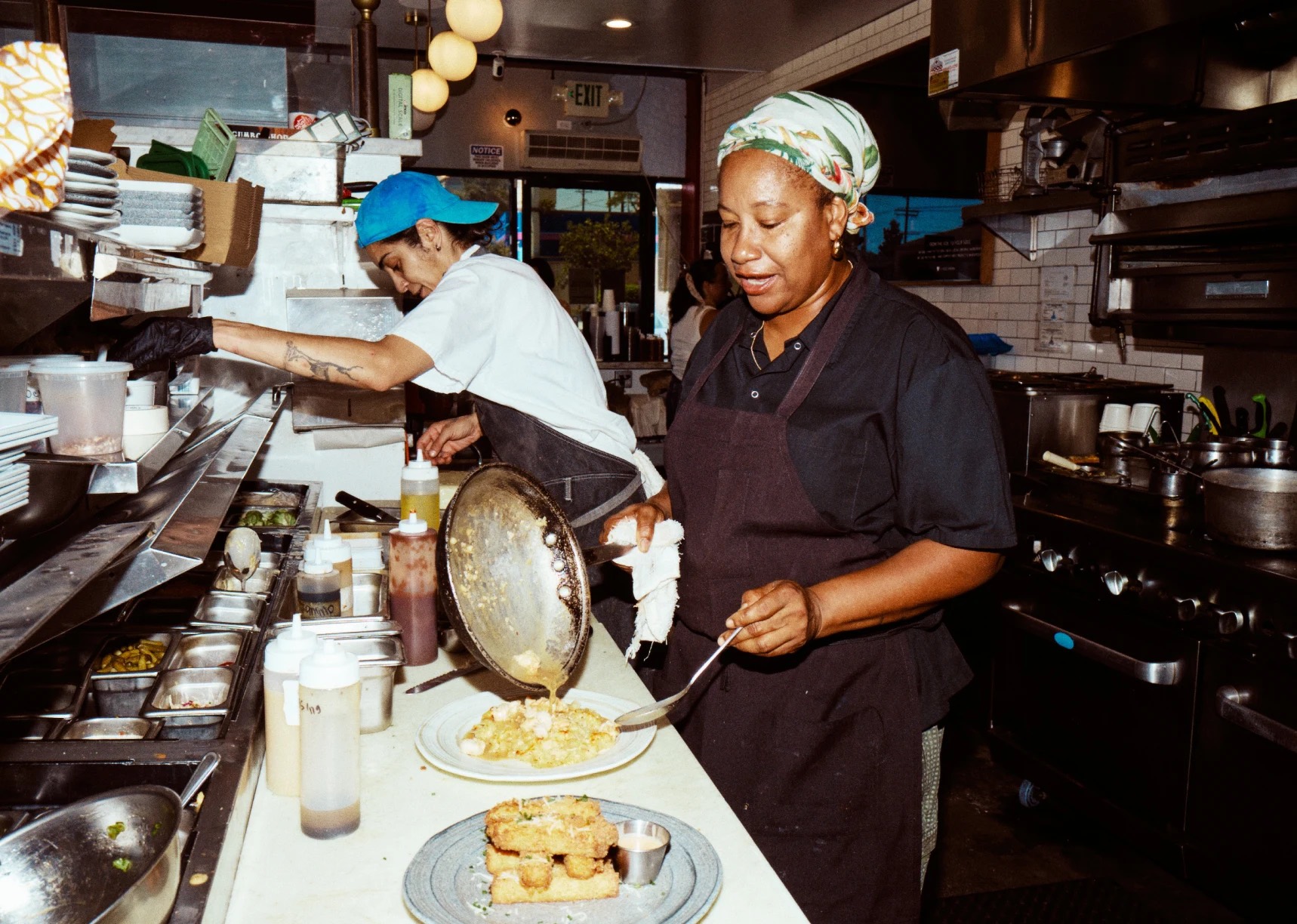 A restaurant team preparing orders